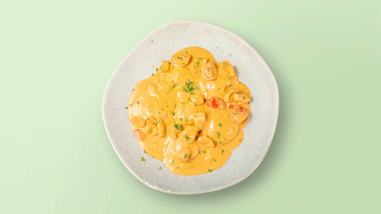 RAVIOLI ME PULË, PESTO, GORGONXOLA, SPINAQ, POMODORINI / Ravioli with Chicken, Pesto, Gorgonzola, Spinach, Pomodorini